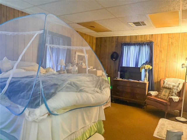 38727 State Highway 96, Klamath River, CA 96050 - carpeted bedroom with wooden walls and a paneled ceiling