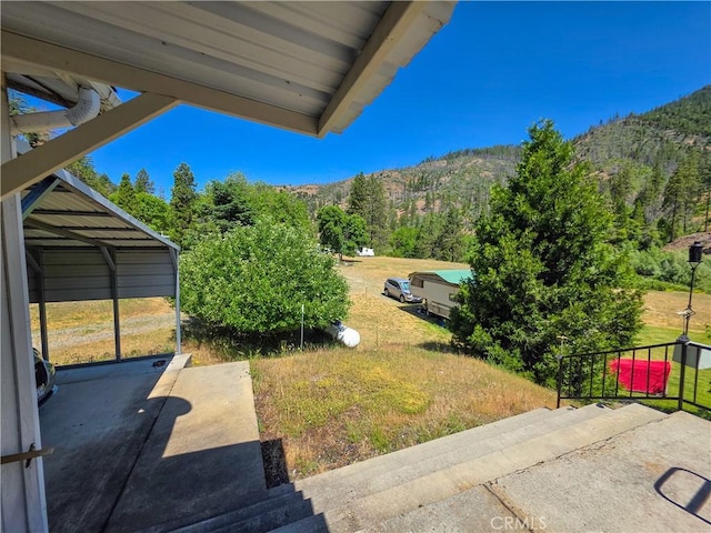 38727 State Highway 96, Klamath River, CA 96050 - view of green lawn featuring a mountain view and a view of trees