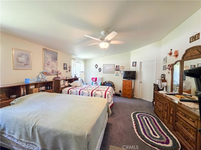 38727 State Highway 96, Klamath River, CA 96050 - bedroom with dark carpet, vaulted ceiling, and a ceiling fan