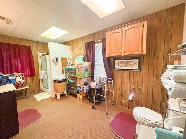 38727 State Highway 96, Klamath River, CA 96050 - miscellaneous room featuring wood walls and light colored carpet