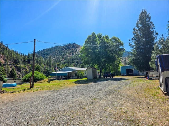 38727 State Highway 96, Klamath River, CA 96050 - view of dirt / gravel road with a mountain view