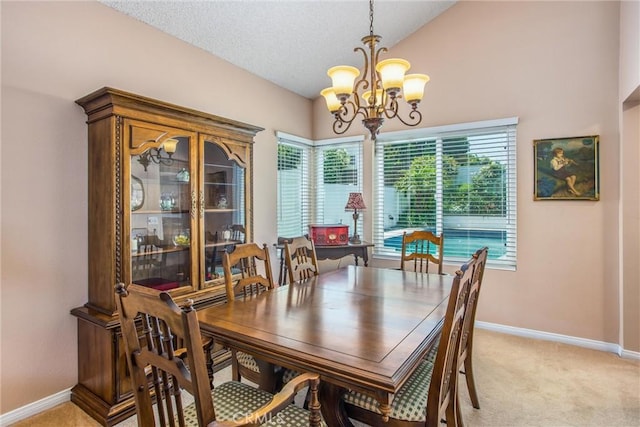 100 Waters Ct, Redlands, CA 92374 - dining area with a chandelier, plenty of natural light, baseboards, light colored carpet, and lofted ceiling