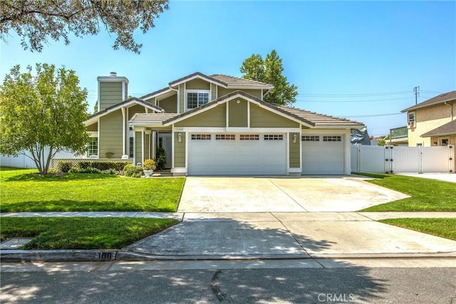 100 Waters Ct, Redlands, CA 92374 - view of front facade with a gate, a garage, driveway, and a chimney