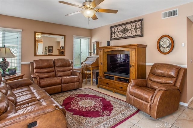 100 Waters Ct, Redlands, CA 92374 - living area featuring a ceiling fan, light tile patterned floors, and baseboards