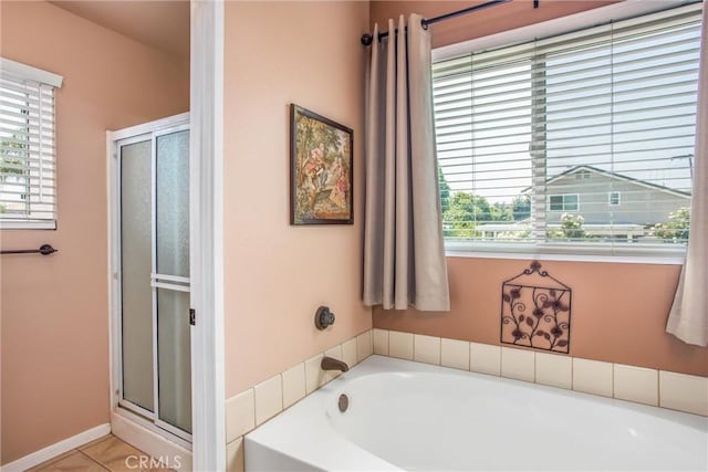 100 Waters Ct, Redlands, CA 92374 - full bathroom featuring plenty of natural light, a garden tub, a shower stall, and tile patterned flooring