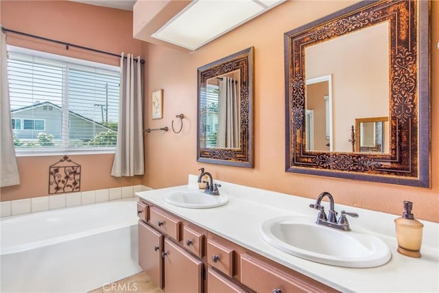 100 Waters Ct, Redlands, CA 92374 - bathroom with healthy amount of natural light, a bath, and double vanity