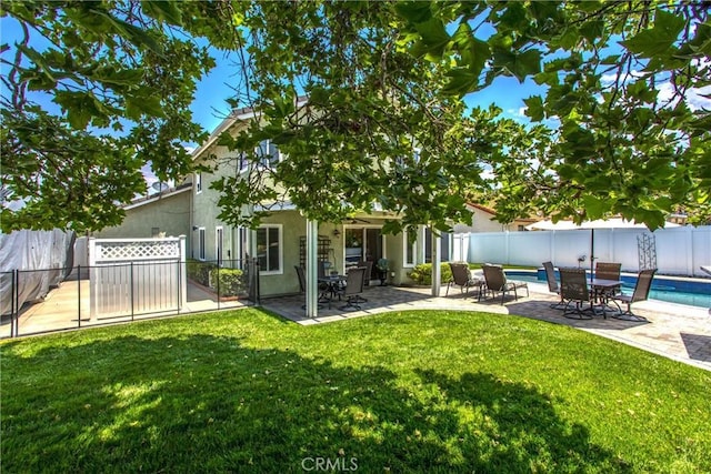 100 Waters Ct, Redlands, CA 92374 - back of house with stucco siding and a patio area