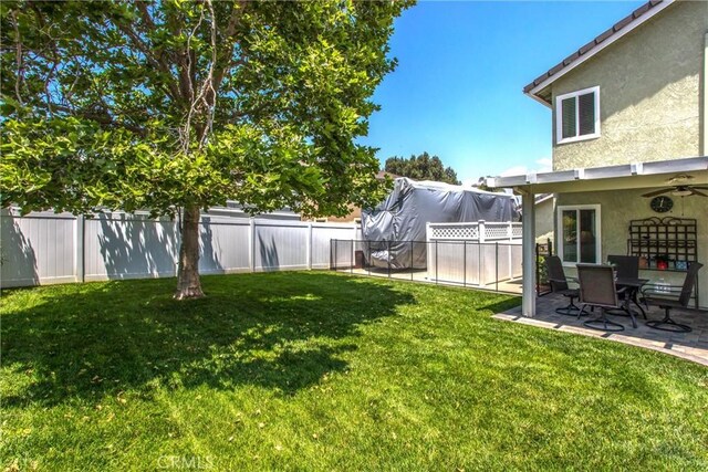 100 Waters Ct, Redlands, CA 92374 - view of yard featuring a patio
