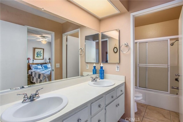 100 Waters Ct, Redlands, CA 92374 - full bath featuring ensuite bath, toilet, double vanity, tile patterned floors, and shower / bath combination with glass door