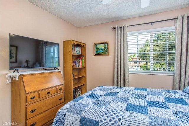 100 Waters Ct, Redlands, CA 92374 - bedroom featuring a textured ceiling and ceiling fan