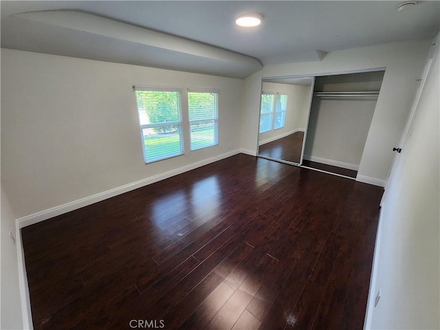 10450 Balboa Blvd, Granada Hills, CA 91344 - unfurnished bedroom with dark wood-style floors, baseboards, and a closet