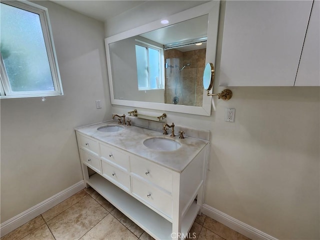 10450 Balboa Blvd, Granada Hills, CA 91344 - full bath featuring baseboards, healthy amount of natural light, double vanity, and tiled shower