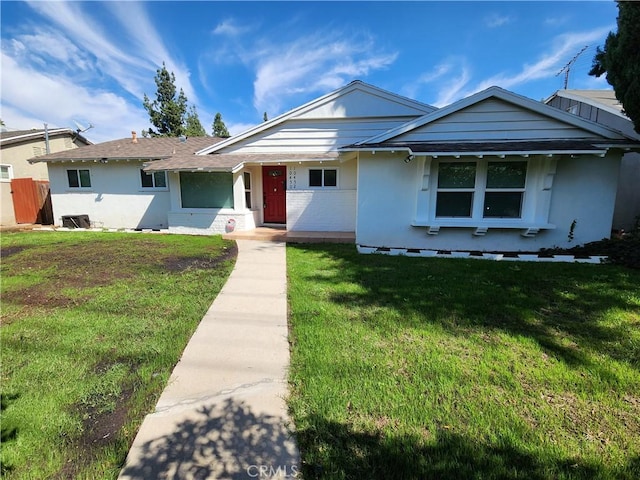 10450 Balboa Blvd, Granada Hills, CA 91344 - ranch-style home with a front lawn and stucco siding