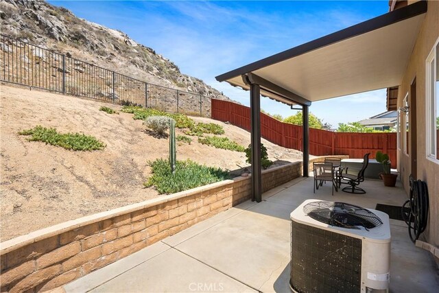 197 Inkster Way, Hemet, CA 92545 - fenced backyard with a patio area, a mountain view, and outdoor dining area