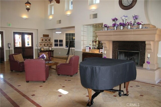 197 Inkster Way, Hemet, CA 92545 - living room with a towering ceiling and a tile fireplace