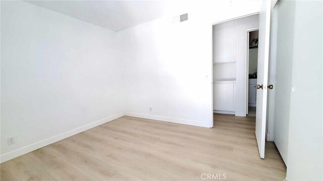 17070 Colima Rd Unit 284, Hacienda Heights, CA 91745 - unfurnished bedroom featuring light wood-style floors and baseboards