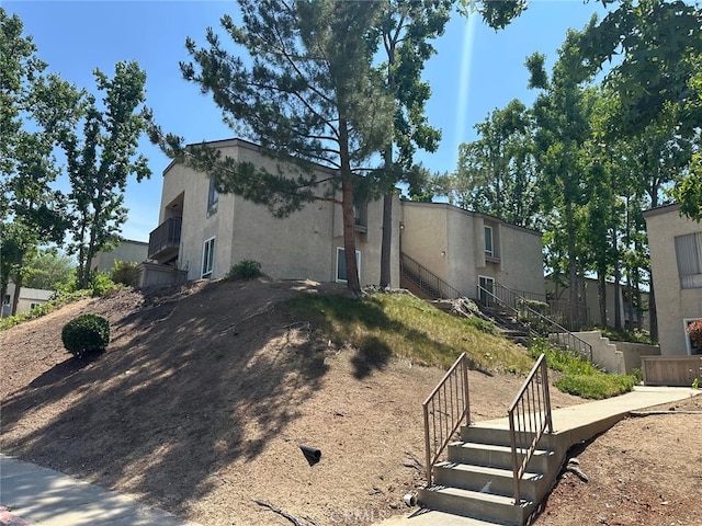 17070 Colima Rd Unit 284, Hacienda Heights, CA 91745 - view of front of home with stucco siding and stairs