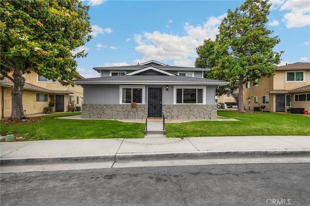 18241 Via Calma Unit 1, Rowland Heights, CA 91748 - bungalow-style house with stone siding, a front yard, and roof with shingles