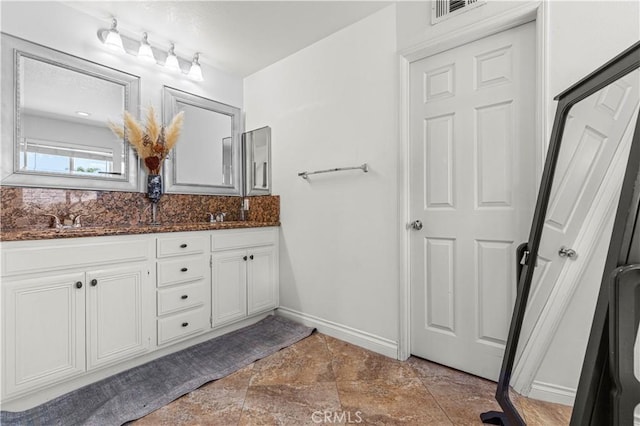 1555 Lupine Cir, Corona, CA 92881 - full bath with double vanity, baseboards, and stone finish floors