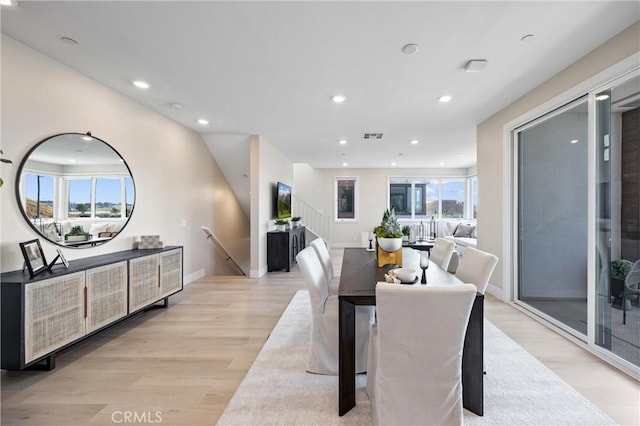 225 Waypoint, Tustin, CA 92782 - dining area with light wood-style flooring, recessed lighting, and baseboards