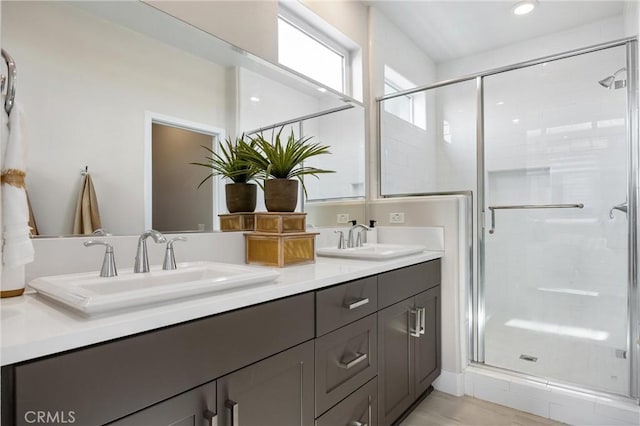 225 Waypoint, Tustin, CA 92782 - bathroom with double vanity, a shower stall, and recessed lighting