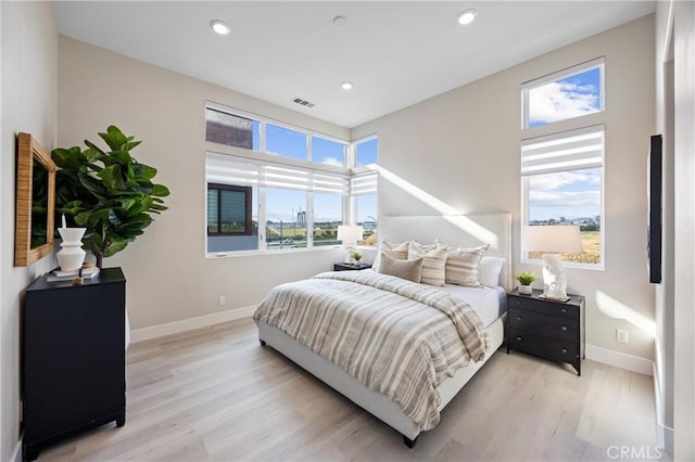 225 Waypoint, Tustin, CA 92782 - bedroom with baseboards, light wood-style flooring, and recessed lighting