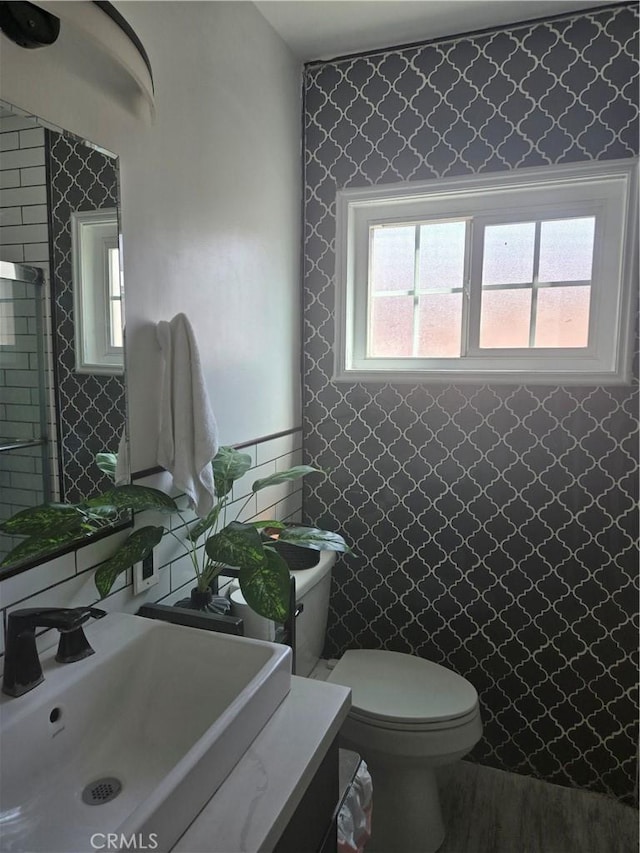 8335 True Ave, Pico Rivera, CA 90660 - bathroom featuring tile walls, vanity, and wood finished floors