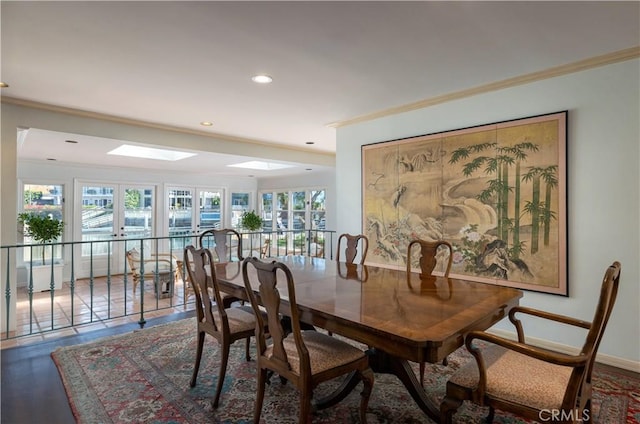1100 Polaris Dr, Newport Beach, CA 92660 - dining space with ornamental molding, a skylight, recessed lighting, and wood finished floors