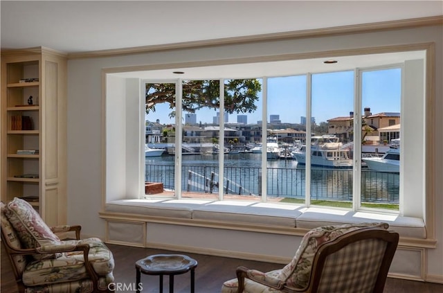 1100 Polaris Dr, Newport Beach, CA 92660 - living area with a water view and wood finished floors