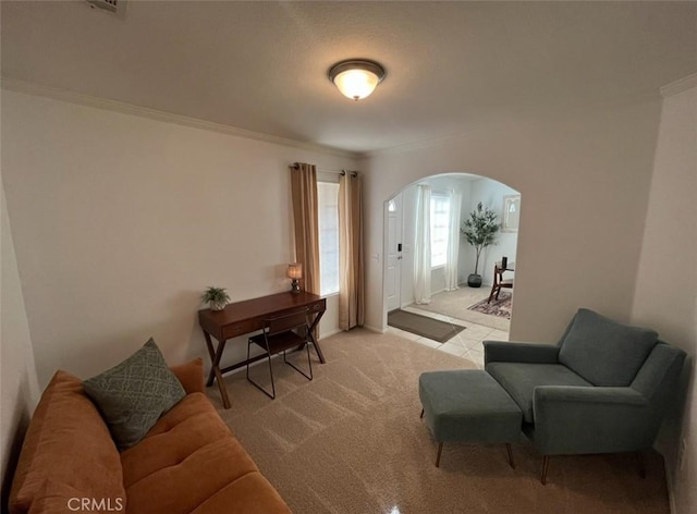 12390 San Dimas St, Victorville, CA 92392 - living room with arched walkways, ornamental molding, and carpet floors