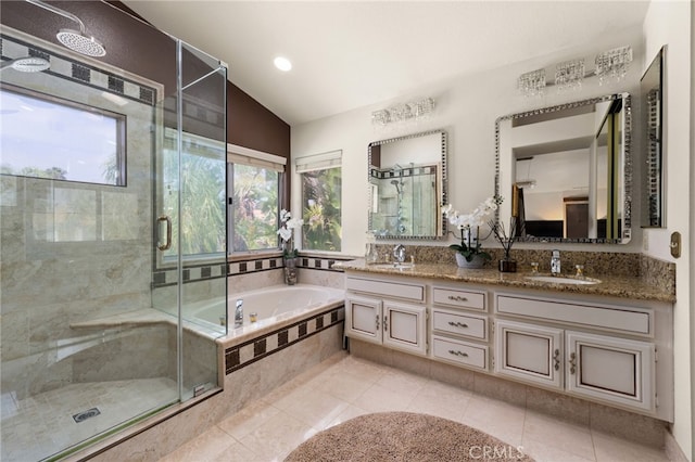 950 Chantel Dr, Corona, CA 92879 - full bath featuring vaulted ceiling, a shower stall, a bath, double vanity, and tile patterned flooring