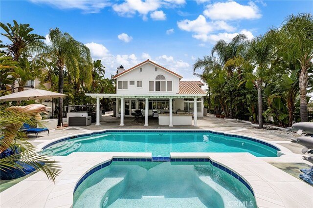 950 Chantel Dr, Corona, CA 92879 - view of pool with a storage structure, a patio, an outbuilding, and a pool with connected hot tub