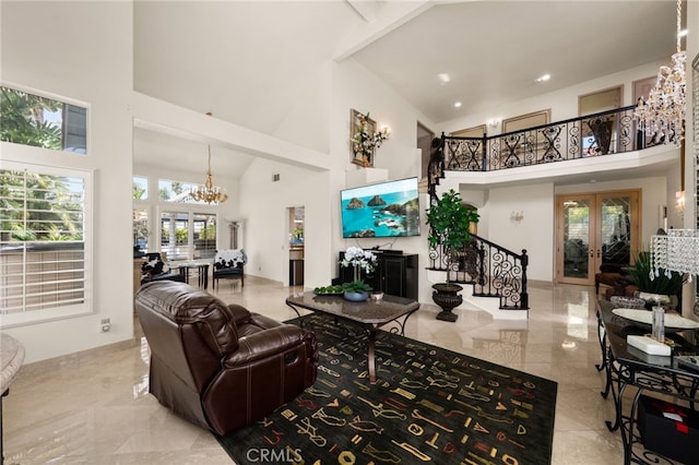 950 Chantel Dr, Corona, CA 92879 - living area with a high ceiling, a chandelier, stairway, french doors, and recessed lighting