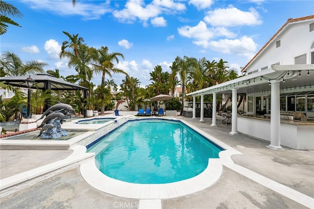 950 Chantel Dr, Corona, CA 92879 - view of pool with a gazebo, a patio area, an outdoor bar, and a pool with connected hot tub