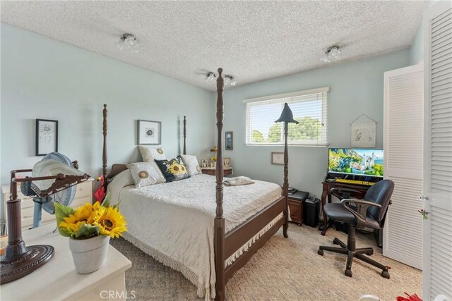 46 Lincoln Ct, Buena Park, CA 90620 - bedroom featuring a textured ceiling and carpet