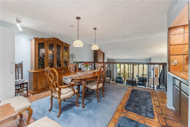 46 Lincoln Ct, Buena Park, CA 90620 - dining area with a textured ceiling and light tile patterned flooring