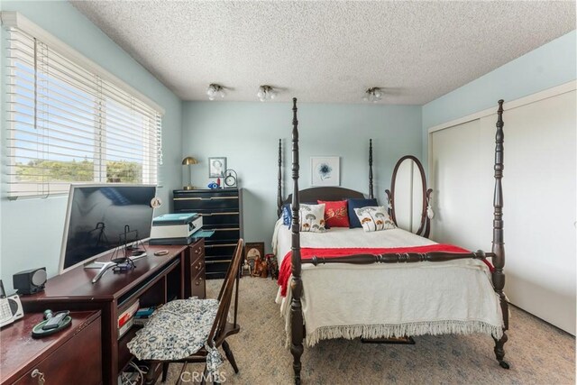 46 Lincoln Ct, Buena Park, CA 90620 - bedroom featuring a textured ceiling, carpet floors, and a desk