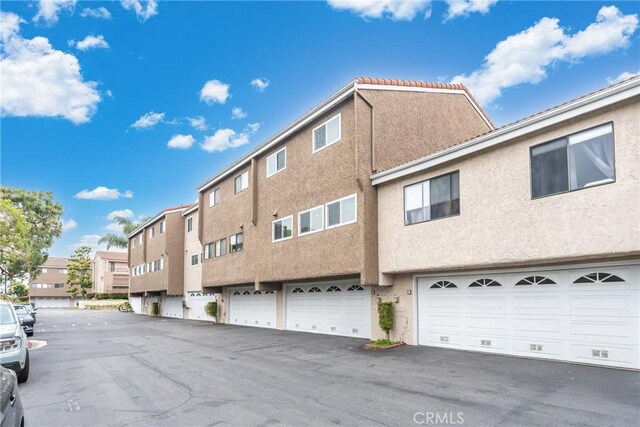 46 Lincoln Ct, Buena Park, CA 90620 - view of asphalt street featuring a residential view