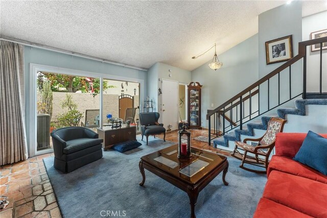 46 Lincoln Ct, Buena Park, CA 90620 - living area featuring a textured ceiling, stairway, and lofted ceiling