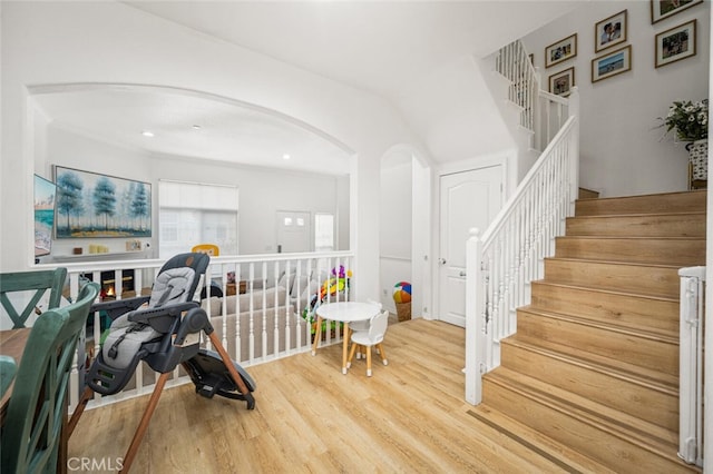 5740 S Glennie Ln Unit C, Los Angeles, CA 90016 - exercise room with arched walkways and wood finished floors