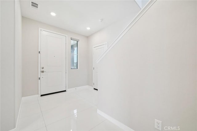 16773 Grapefruit Ln, Fontana, CA 92336 - foyer with light tile patterned flooring and recessed lighting