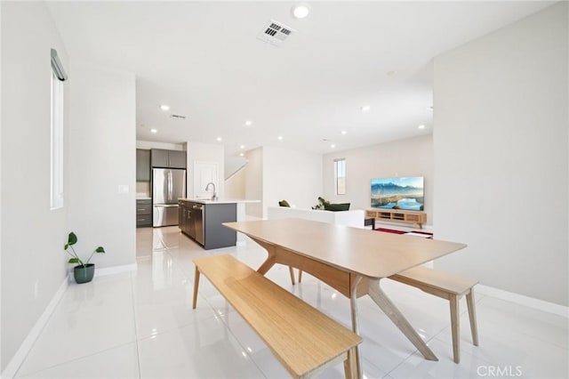 16773 Grapefruit Ln, Fontana, CA 92336 - dining room featuring light tile patterned floors and recessed lighting