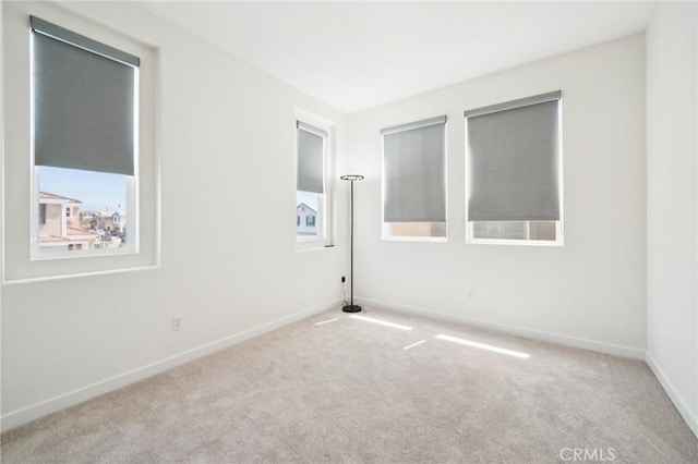 16773 Grapefruit Ln, Fontana, CA 92336 - carpeted spare room featuring baseboards