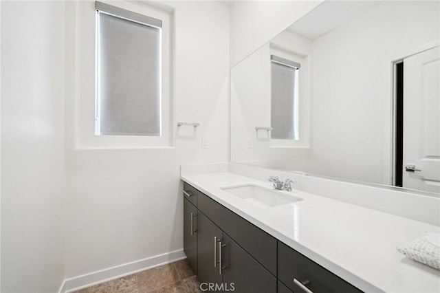 16773 Grapefruit Ln, Fontana, CA 92336 - bathroom with baseboards and vanity