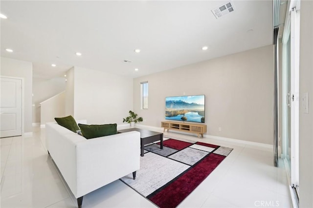 16773 Grapefruit Ln, Fontana, CA 92336 - living room featuring recessed lighting and baseboards
