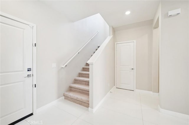 16773 Grapefruit Ln, Fontana, CA 92336 - staircase featuring tile patterned flooring and recessed lighting