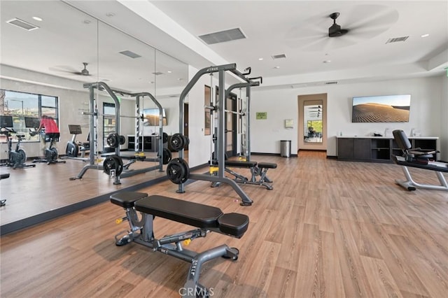 16773 Grapefruit Ln, Fontana, CA 92336 - exercise room with a ceiling fan, light wood finished floors, and recessed lighting