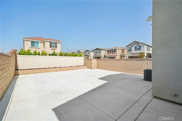 16773 Grapefruit Ln, Fontana, CA 92336 - fenced backyard featuring a residential view and a patio area