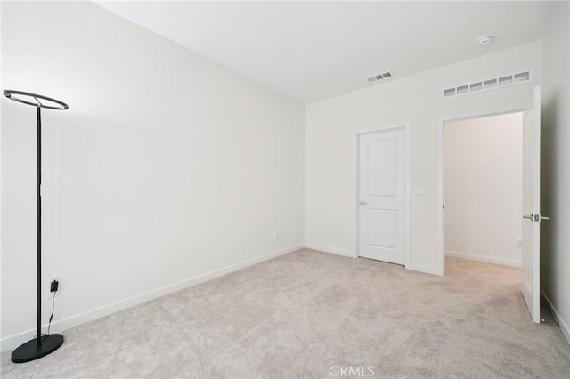 16773 Grapefruit Ln, Fontana, CA 92336 - unfurnished bedroom with light carpet and baseboards