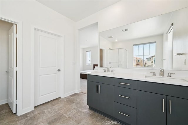 16773 Grapefruit Ln, Fontana, CA 92336 - full bathroom with double vanity, healthy amount of natural light, and a stall shower